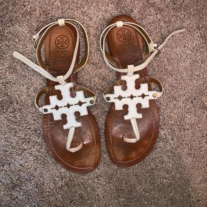 Tory Burch white sandals.